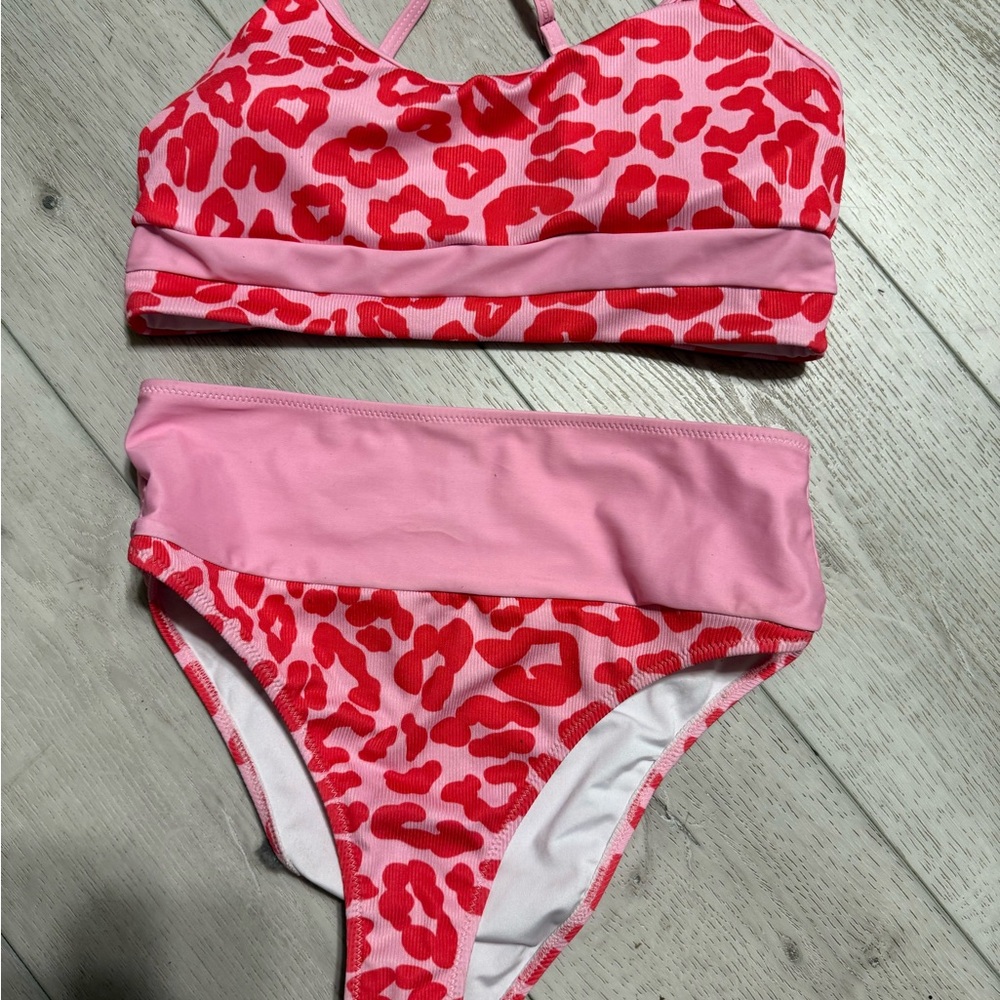 Kids Swimwear Set in Pink and Red. Only worn a couple times In good condition